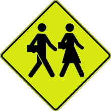 Signal avancé d'une zone scolaire ou d'un passage pour écoliers