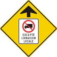 Signal avancé d'accès interdit aux camions sauf pour livraison locale
