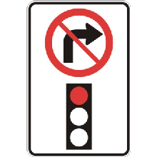 Virage à droite interdit au feu rouge.